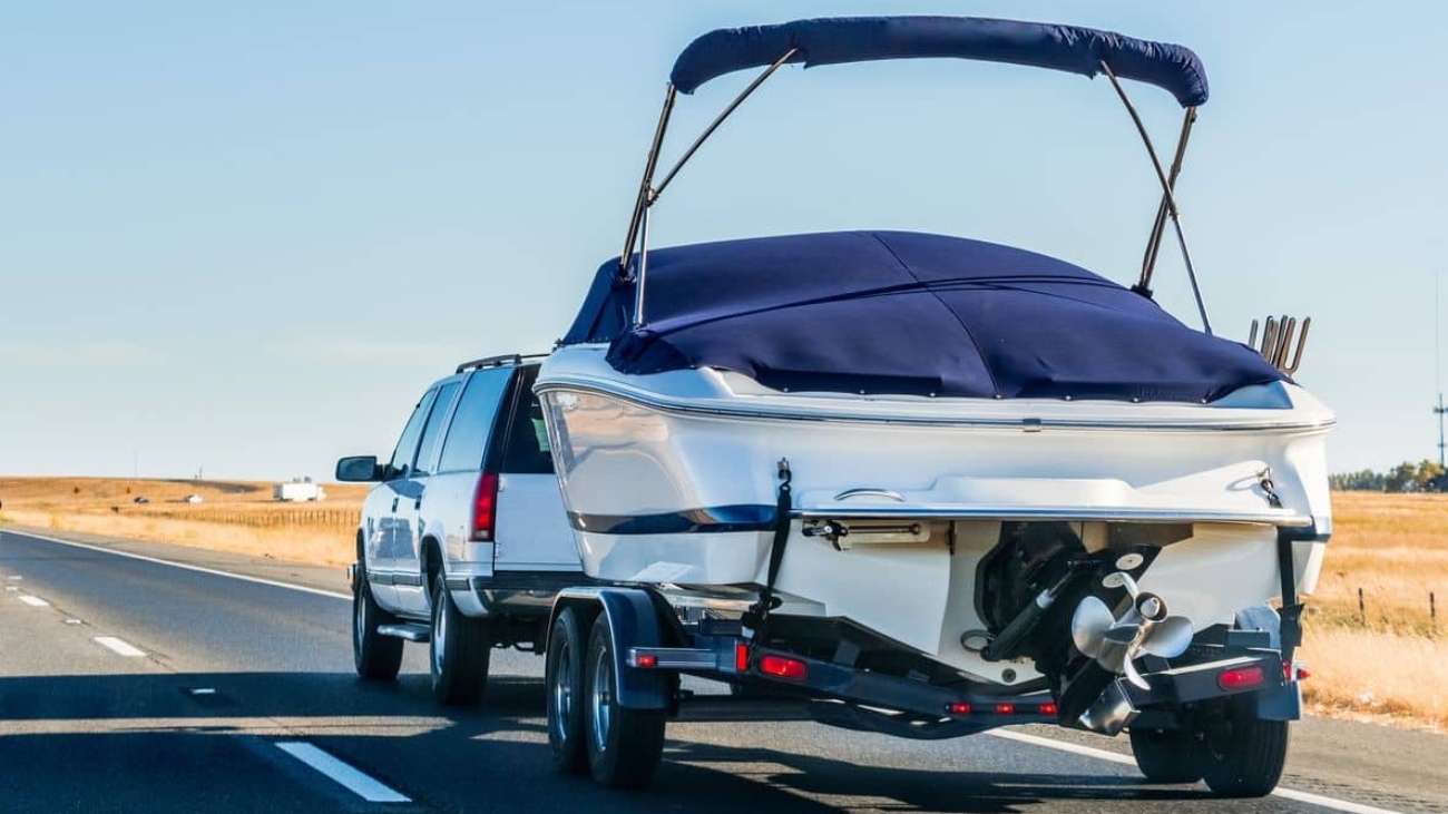 truck-towing-a-boat-on-the-interstate-california-2023-11-27-04-50-55-utc