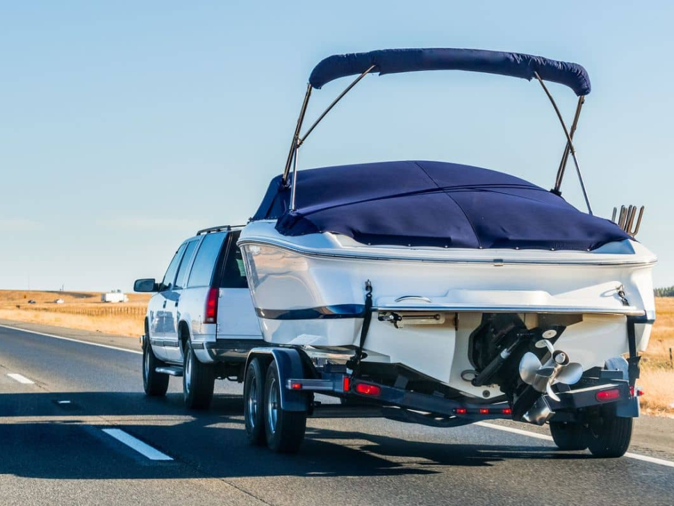 truck-towing-a-boat-on-the-interstate-california-2023-11-27-04-50-55-utc
